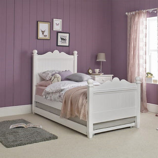 Single trundle bed underneath the bed