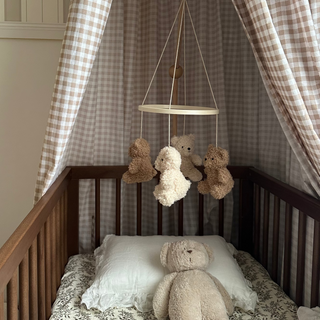 walnut cot bed with teddy bear mobile
